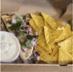 1 Vegetarian Taco, Chips & Dip + Small Punch